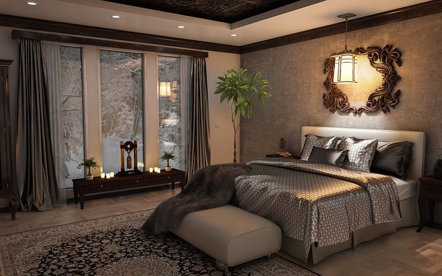 luxusní ložnice, hnědé barvy, doplněné světlem a dekorací